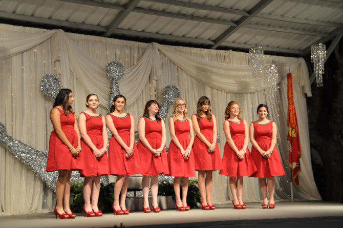 queen contestants lined up on stage