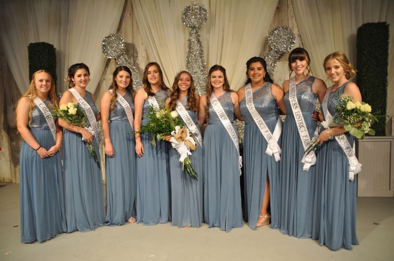 all queen contestants posing with sashes