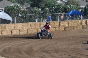 racer driving atv on the track